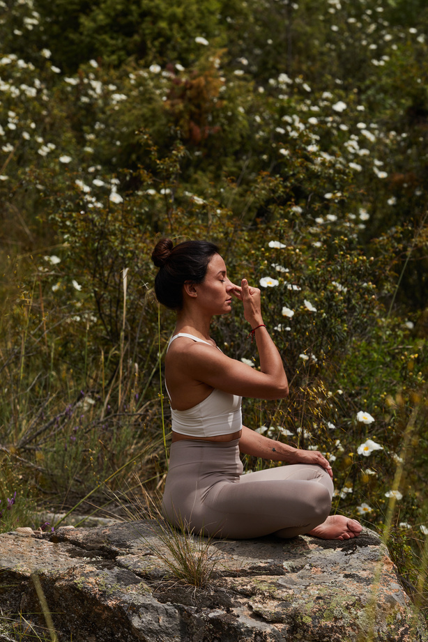 Woman Doing Yoga Exercise in Nature